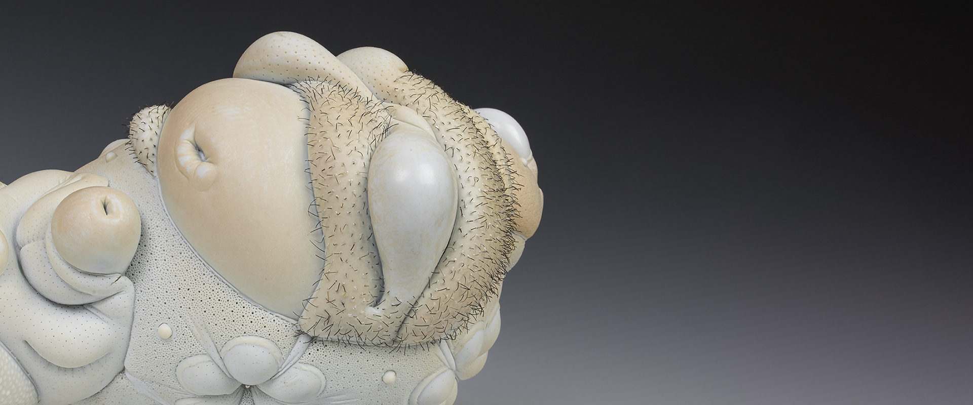Jason Briggs "Olympia" (detail). porcelain, hair, and mixed media sculpture ceramics.