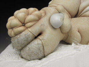 Jason Briggs "Angel" (detail 1). Porcelain, hair, and mixed media sculptural ceramic art.