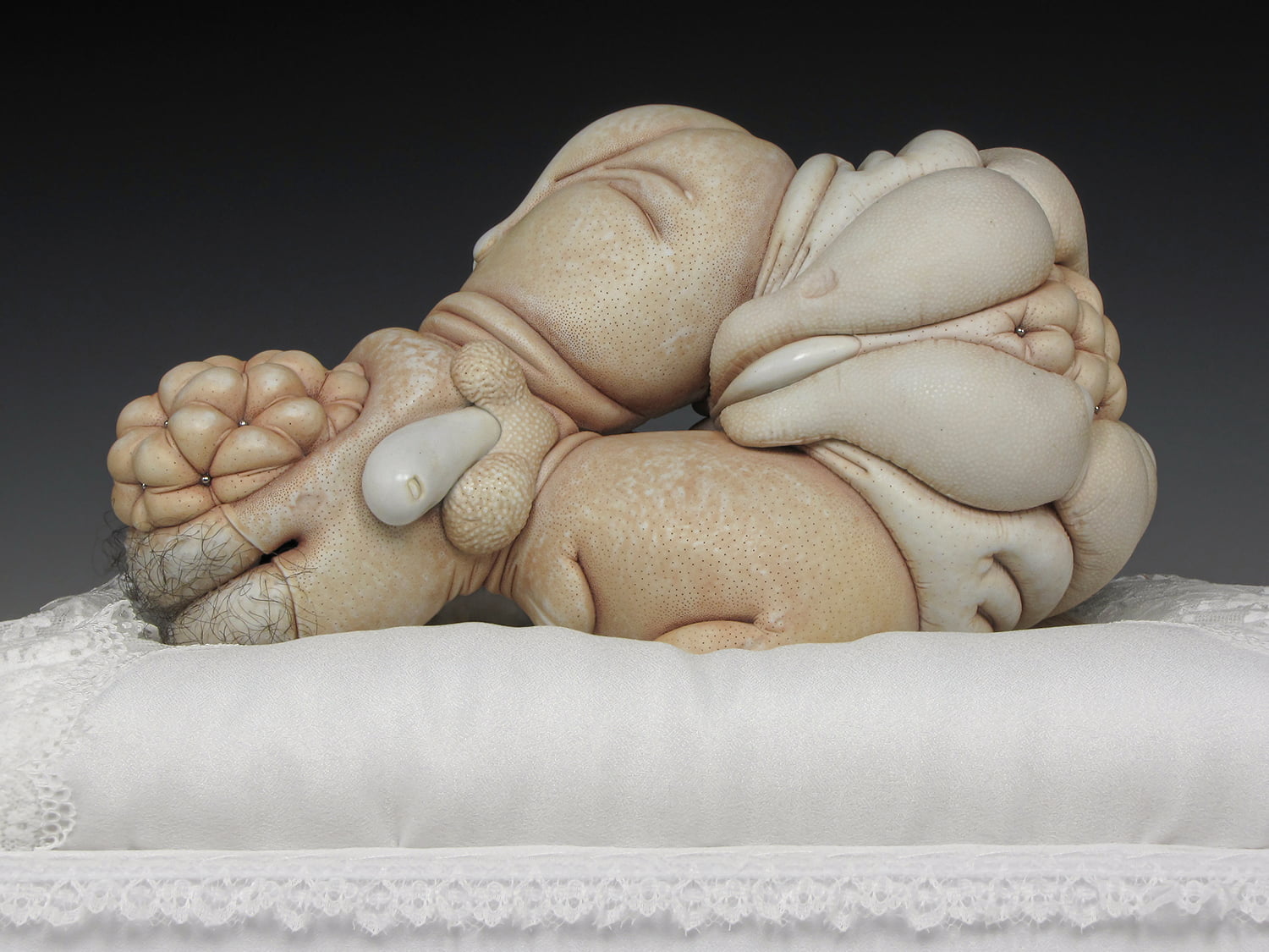 Jason Briggs "Angel". Porcelain, hair, and mixed media sculptural ceramic art.