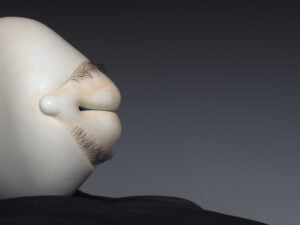 Jason Briggs "Baby" (detail 3). Porcelain, hair, and mixed media sculptural ceramic art.