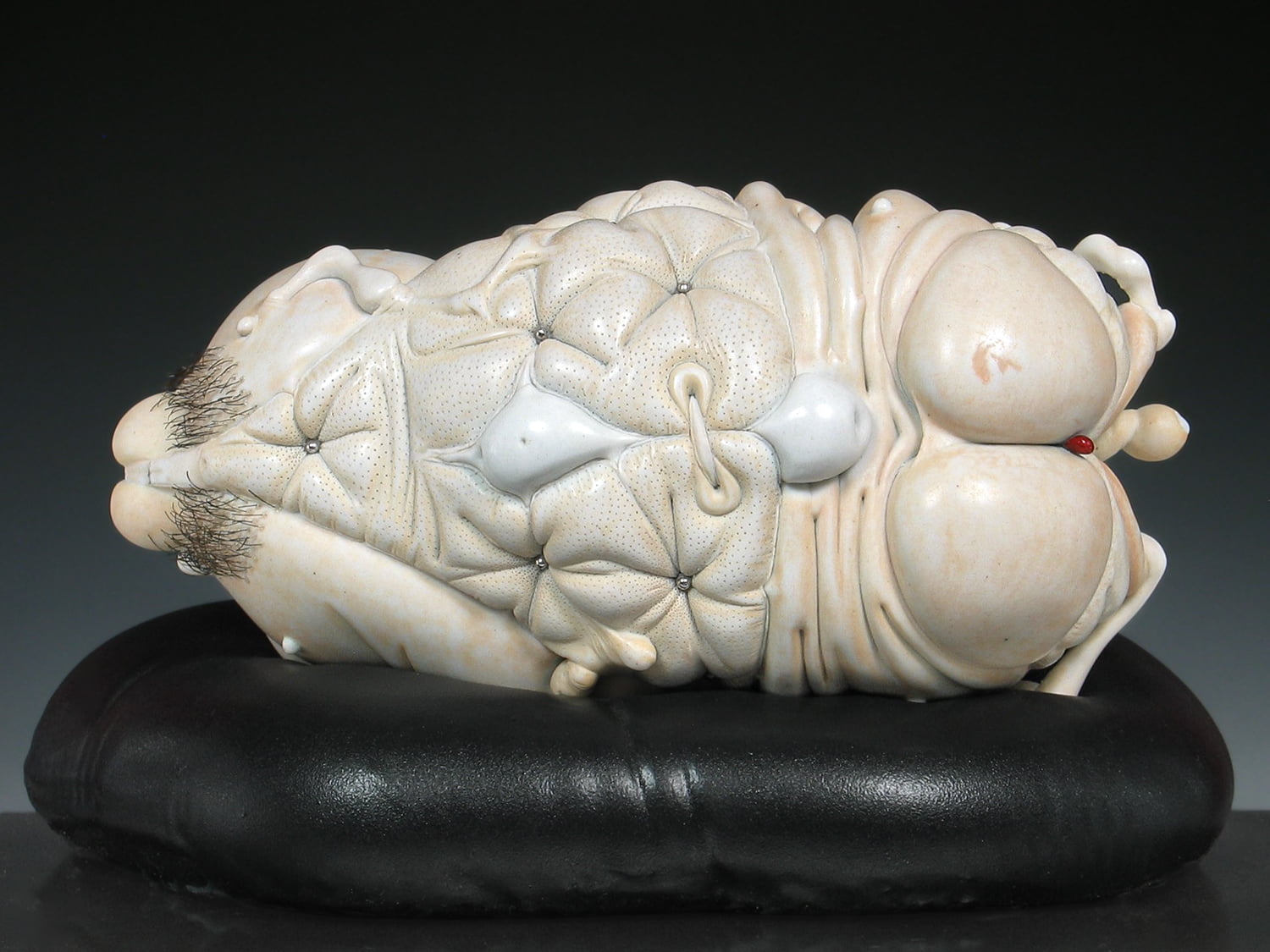 Jason Briggs "Cinch" (alternate view). Porcelain, hair, and mixed media sculptural ceramic art.
