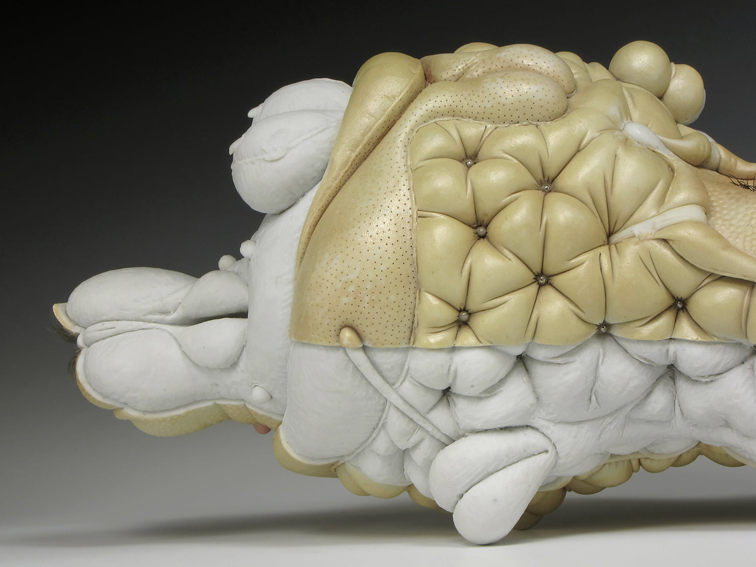 Jason Briggs "Peel" (detail 2). Porcelain, hair, and mixed media sculptural ceramic art.