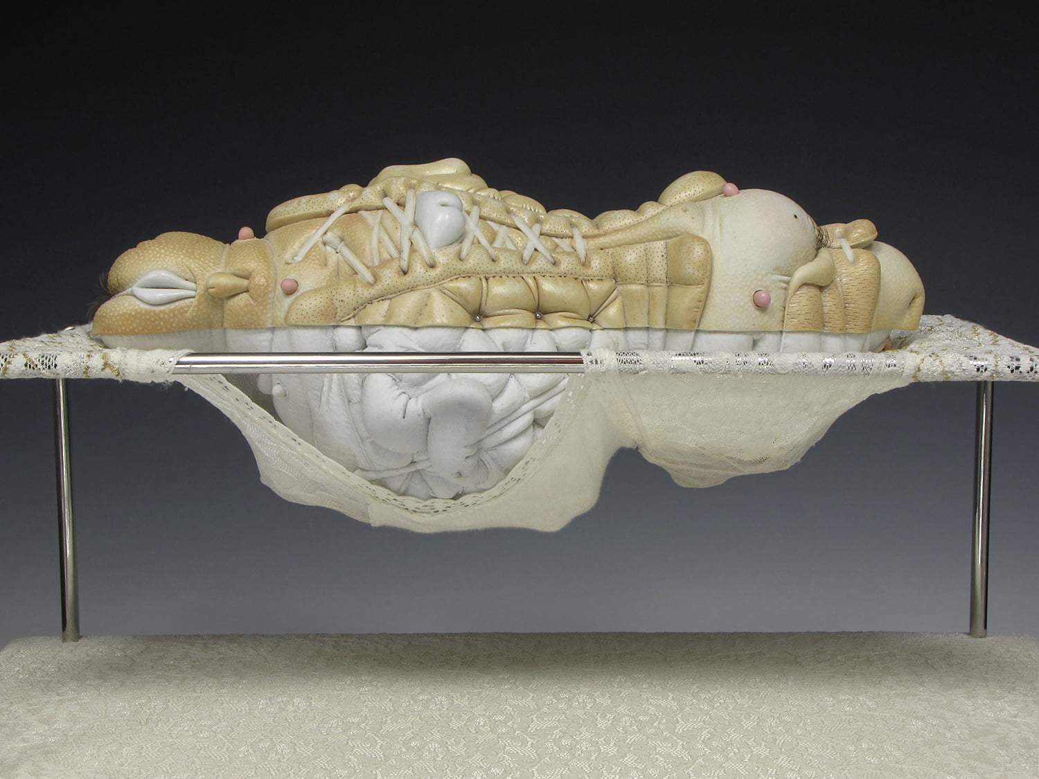 Jason Briggs "Peel". Porcelain, hair, and mixed media sculptural ceramic art.