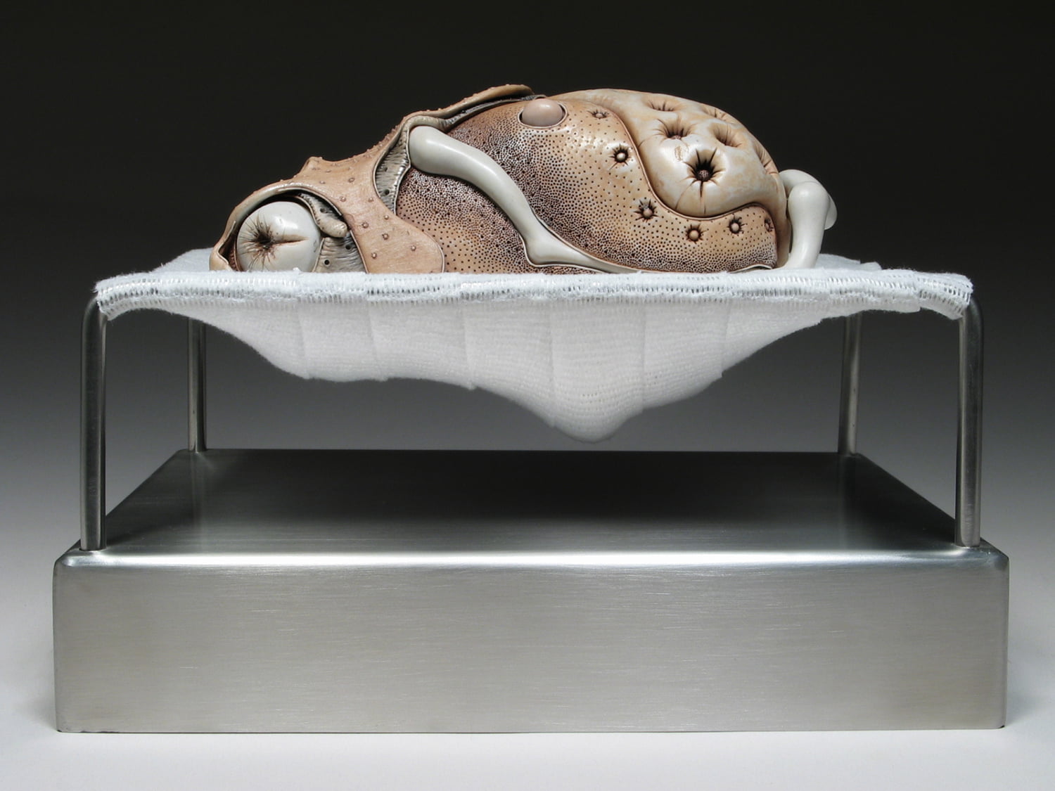 Jason Briggs "Push" (full view). Porcelain, hair, and mixed media. Sculptural ceramic art object.