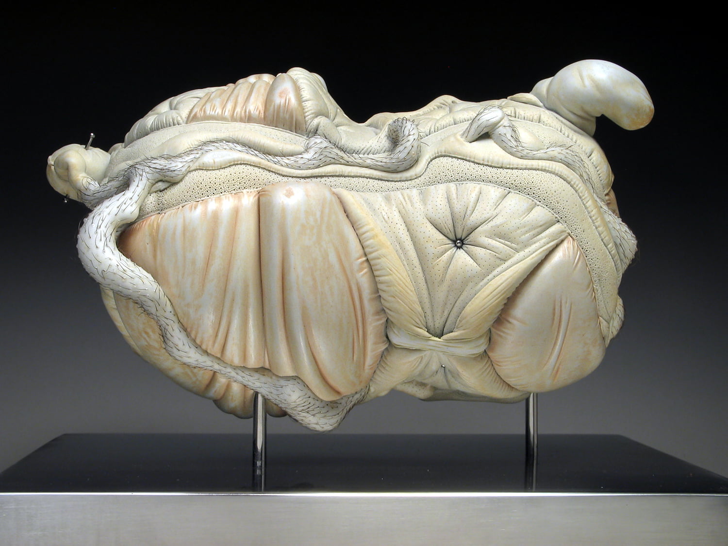 Jason Briggs "Seed" (alternate view). porcelain, hair, and mixed media sculptural ceramic art.