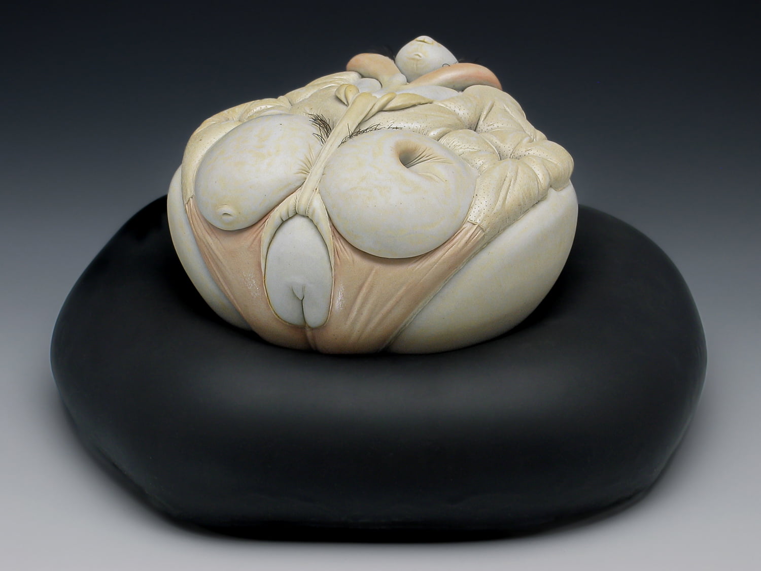 Jason Briggs "Squirt" (alternate view). Porcelian, hair, and mixed media. Sculptural ceramic art object.