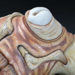 Jason Briggs "Stretch" (detail). Porcelain, hair, and mixed media. Sculptural ceramic art object.