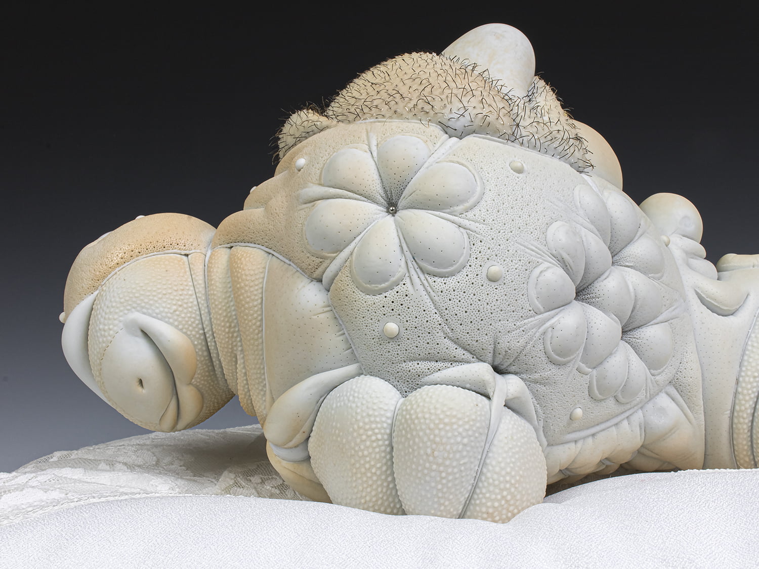 Jason Briggs "Olympia" (detail 3). porcelain, hair, and mixed media sculpture ceramics.