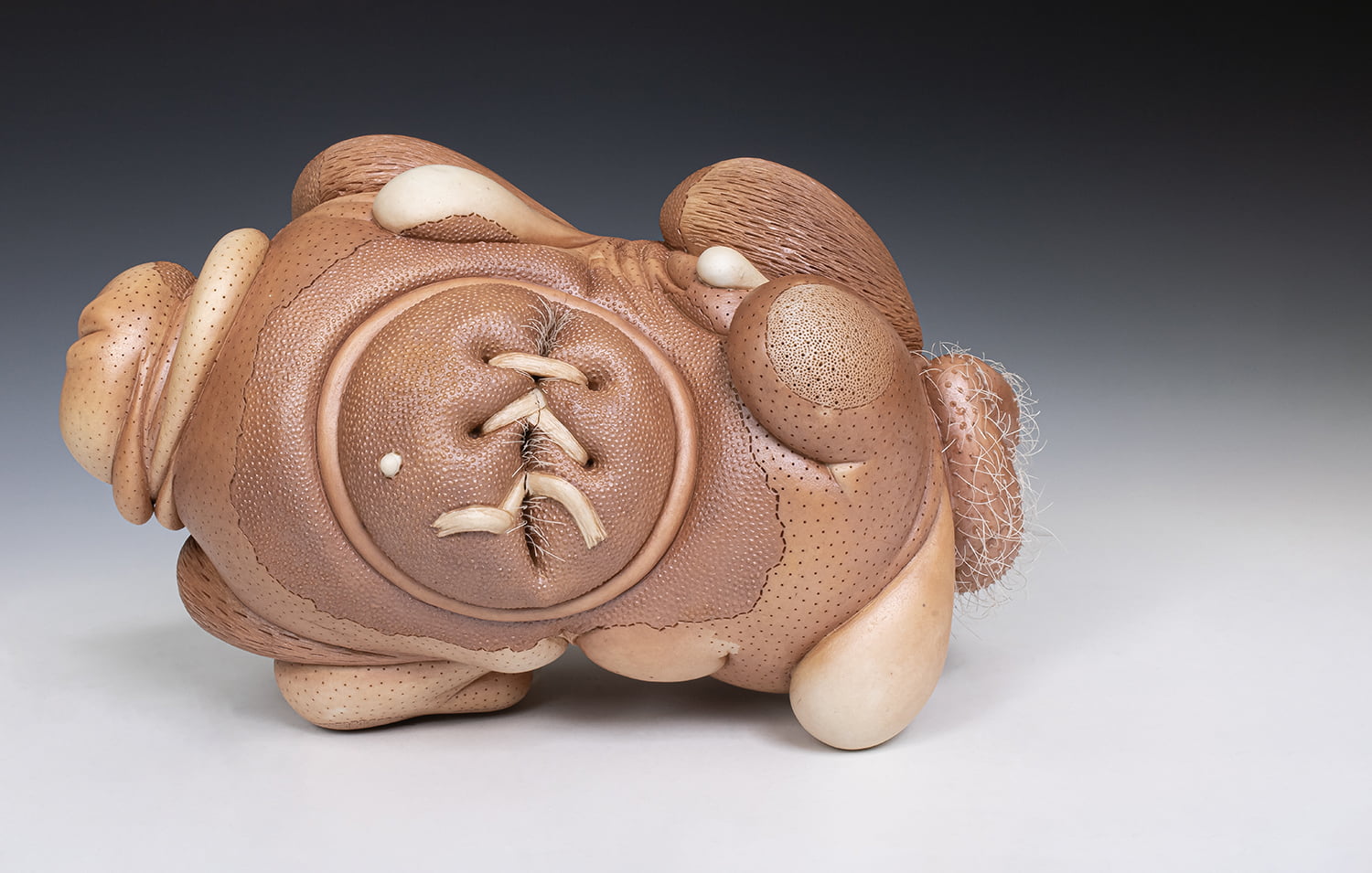 Jason Briggs "Blush" (long). porcelain, hair, and mixed media sculpture ceramics.