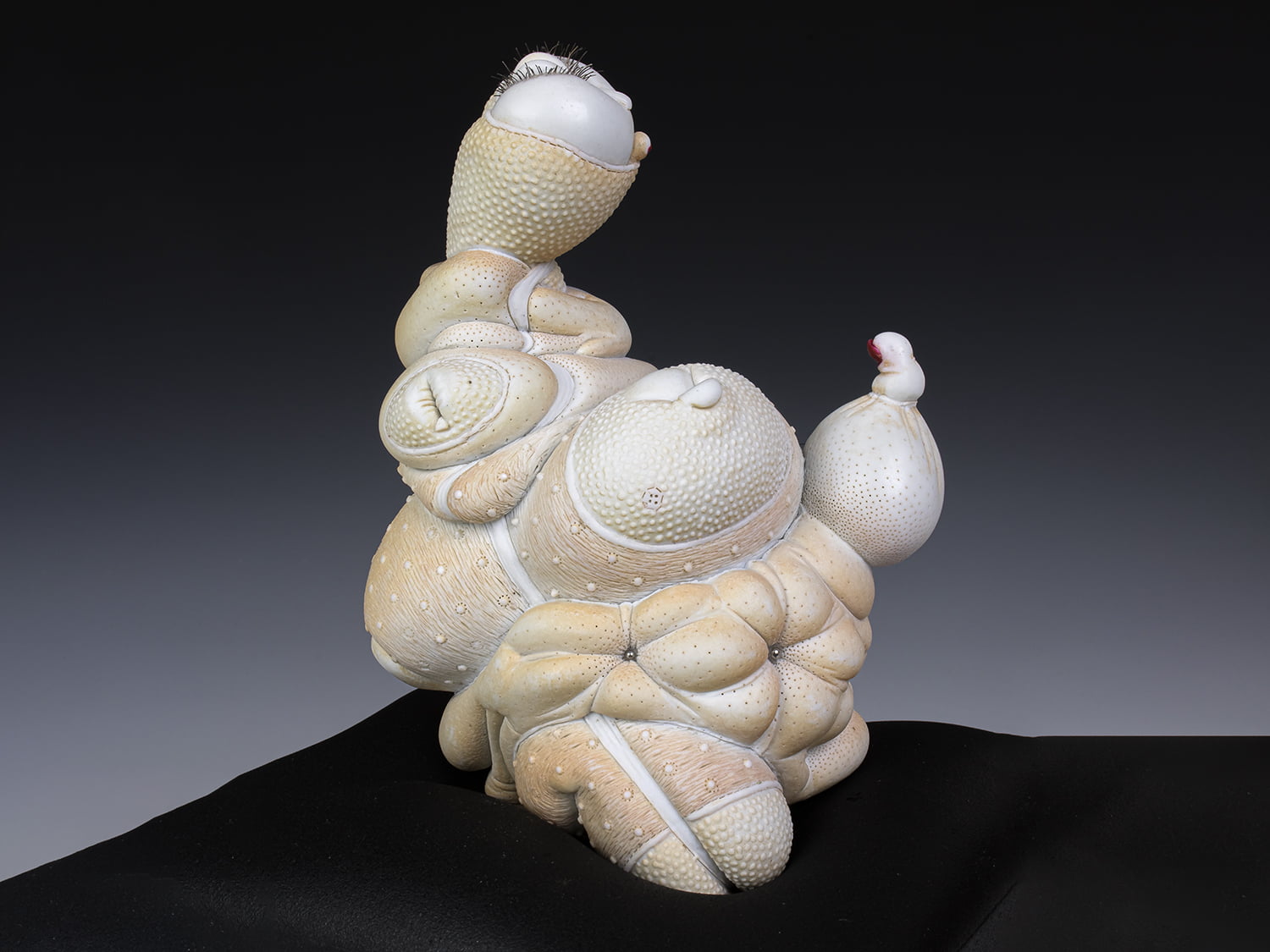 Jason Briggs "Lovie" (alternate view). porcelain, hair, and mixed media sculpture ceramics.