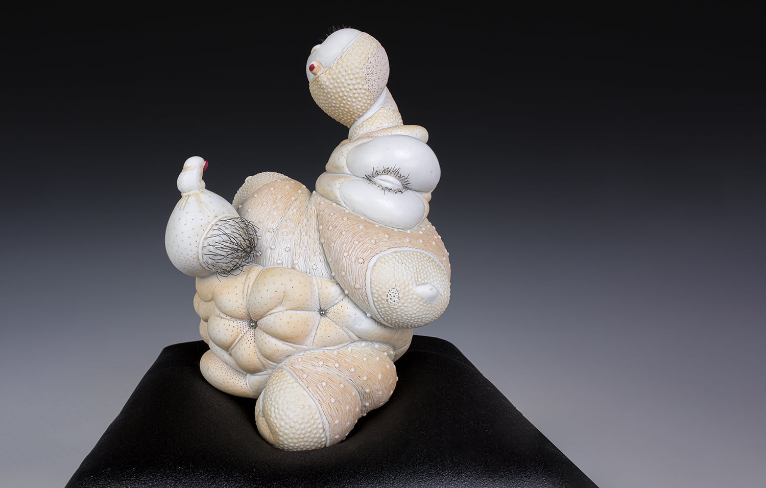 Jason Briggs "Lovie". porcelain, hair, and mixed media sculpture ceramics.