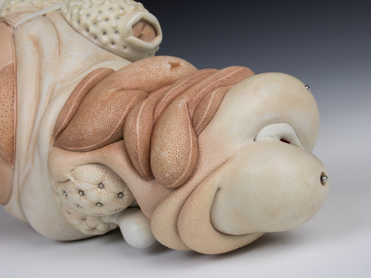 Jason Briggs "Strut" (detail 2). porcelain, hair, and mixed media sculpture ceramics.