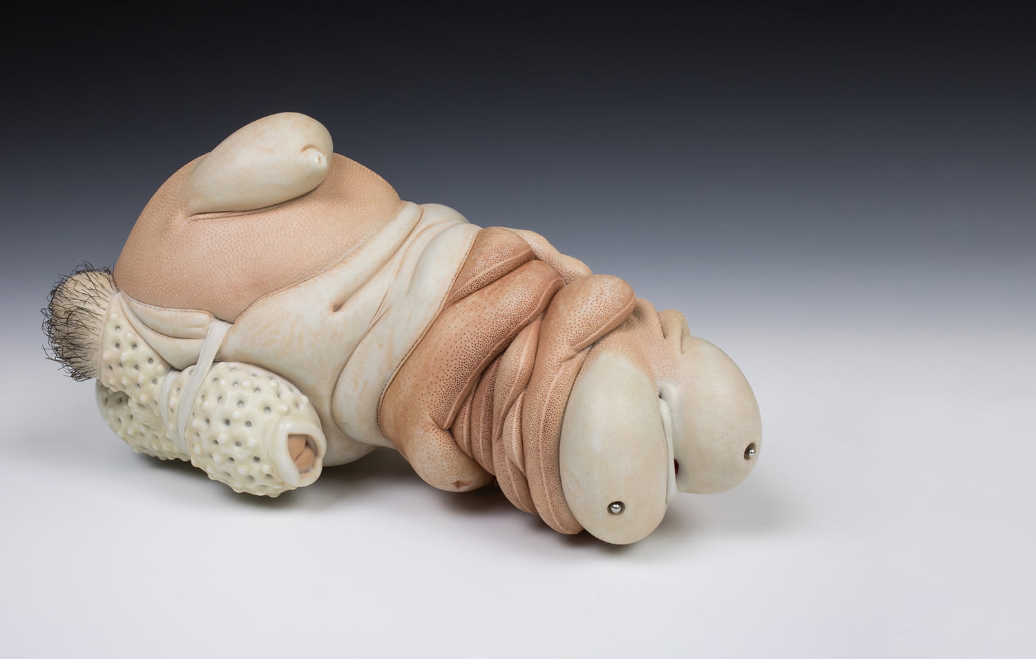 Jason Briggs "Strut" (long). porcelain, hair, and mixed media sculpture ceramics.