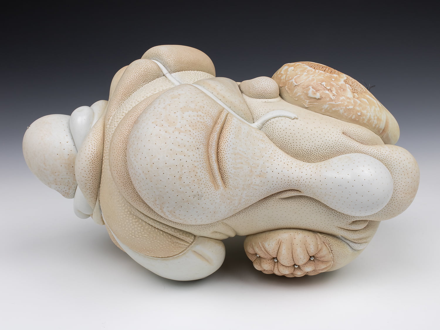 Jason Briggs "Suave" (alternate view). porcelain, hair, and mixed media sculpture ceramics.