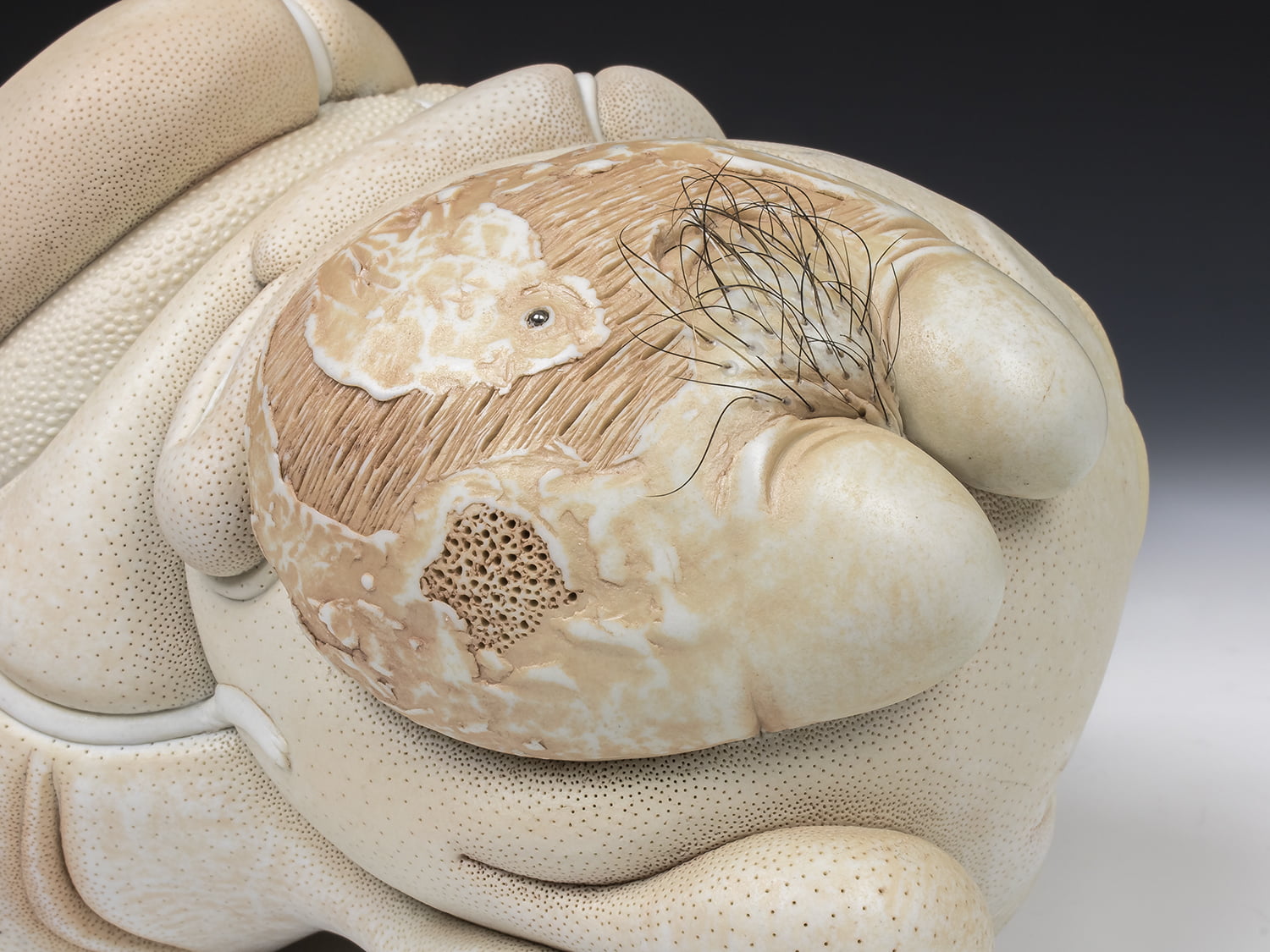 Jason Briggs "Suave" (detail 4). porcelain, hair, and mixed media sculpture ceramics.