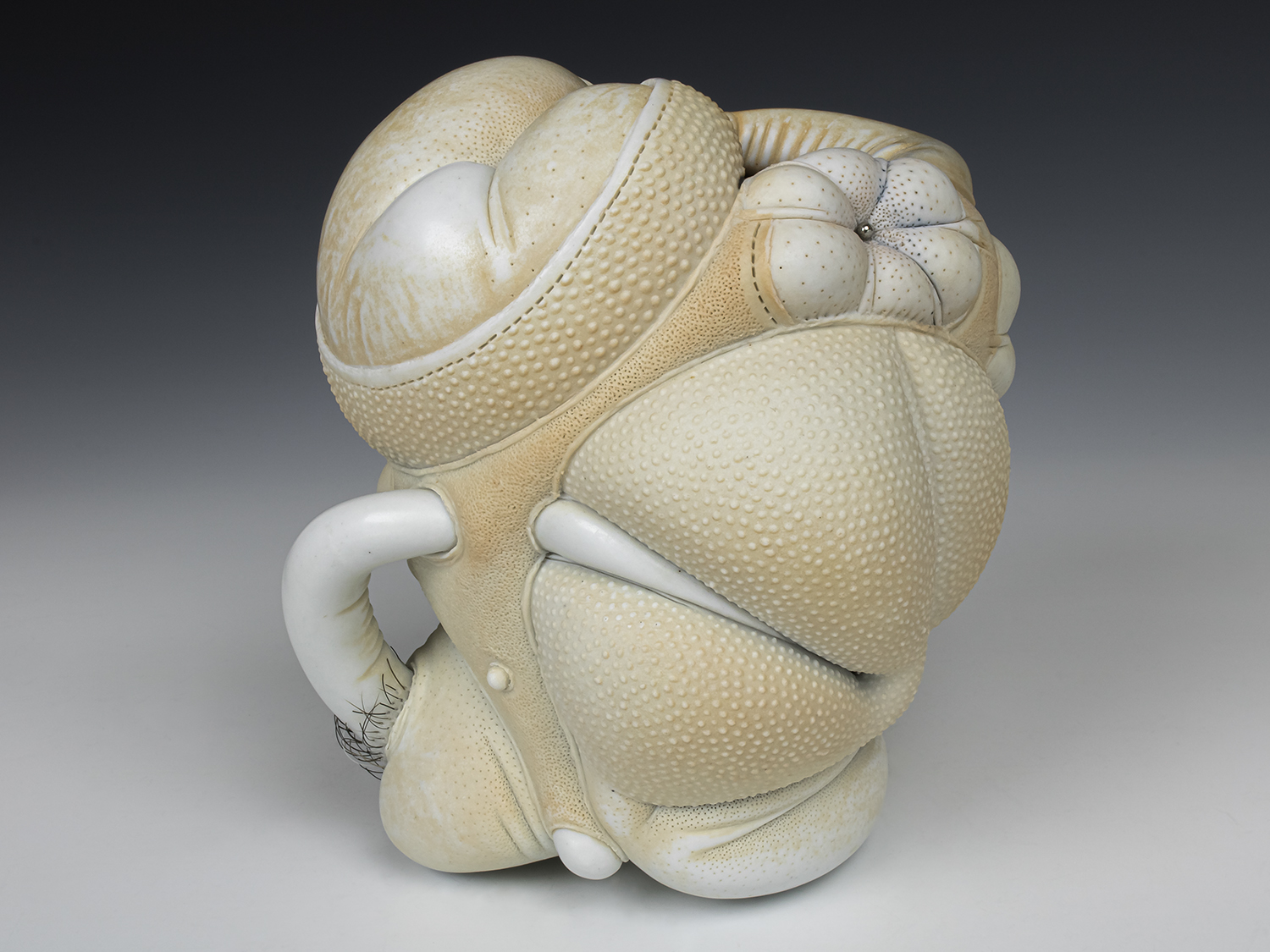 Jason Briggs "Tip" (alternate view). porcelain, hair, and mixed media sculpture ceramics.