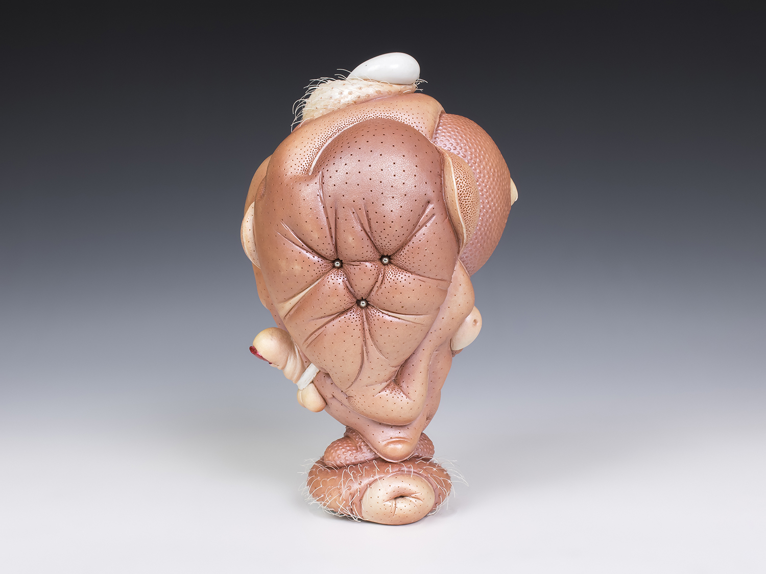 Jason Briggs "Dandy" (alternate view 1). porcelain, hair, and mixed media sculpture ceramics.