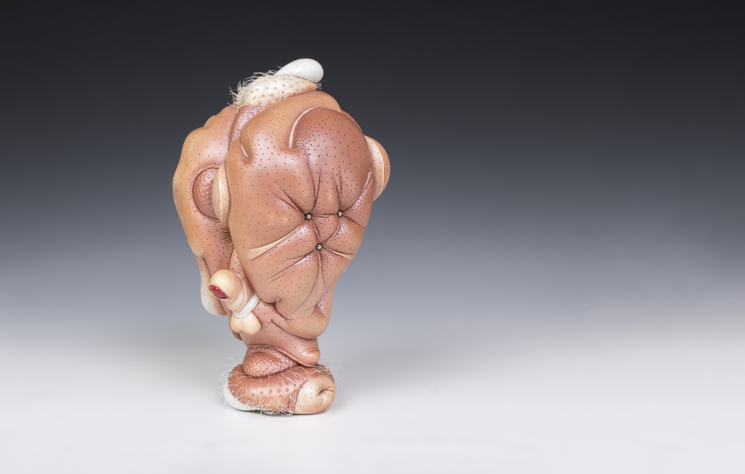 Jason Briggs "Dandy" (long). porcelain, hair, and mixed media sculpture ceramics.