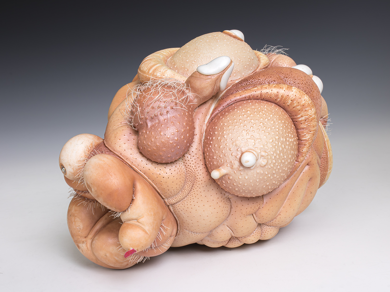Jason Briggs "Roxie" (detail 2). porcelain, hair, nail polish, and mixed media sculpture ceramics.