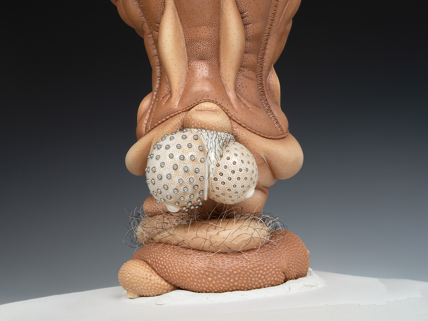 Jason Briggs "Olympus Mons" (detail). porcelain, hair, nail polish, and mixed media sculpture ceramics.